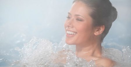 Female Enjoying Hot Tub Winter